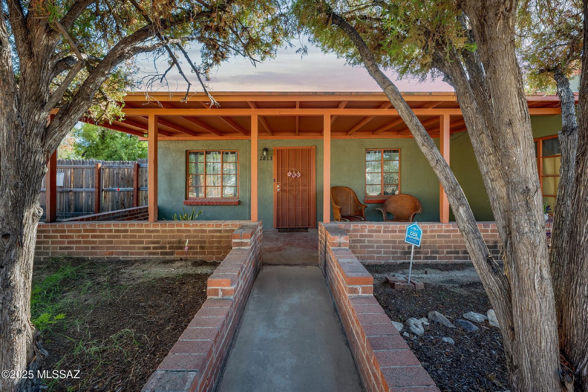 Covered front porch and brick walkway