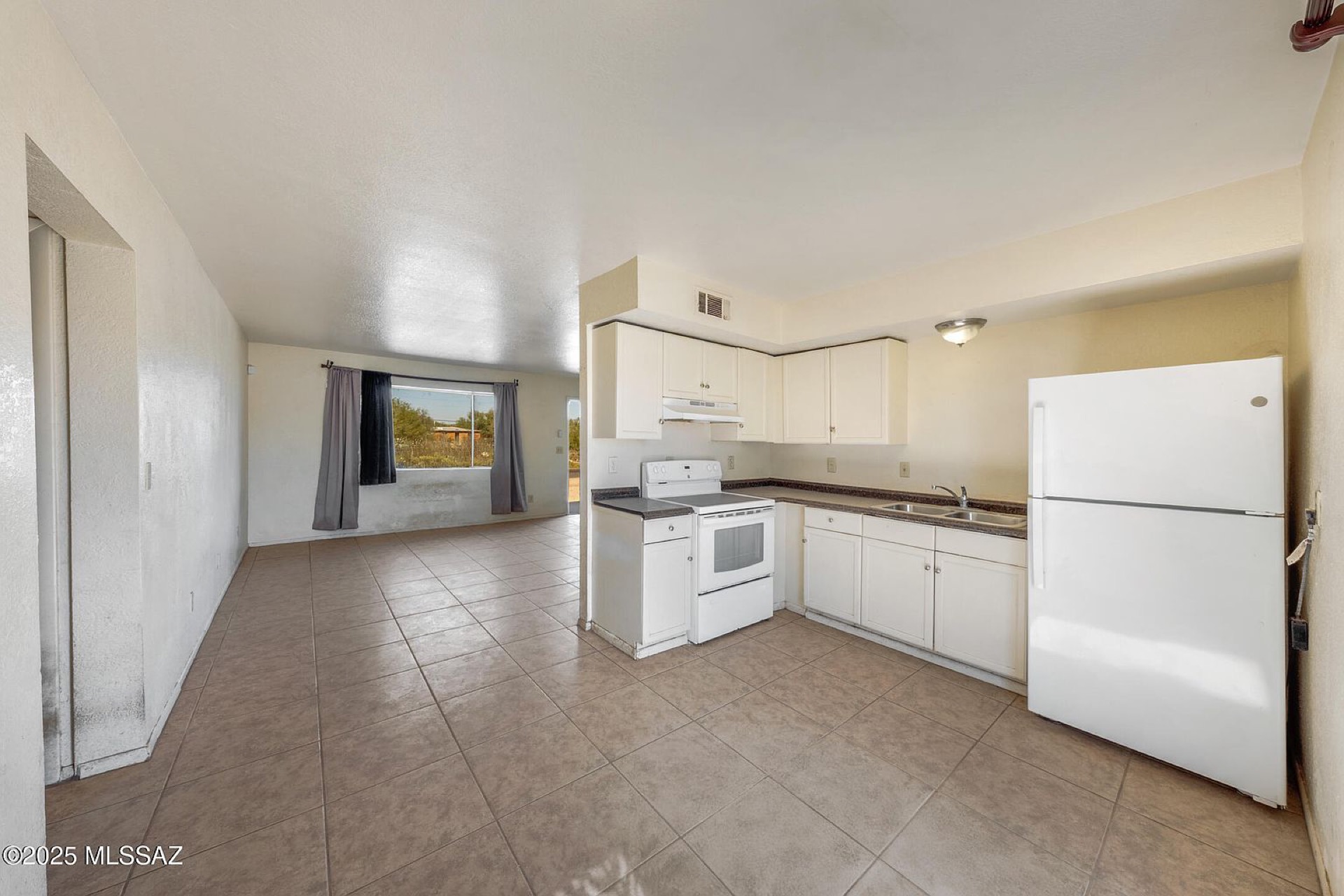 Kitchen open to living area
